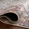 Rolled edge and sewn binding detail of Wynter rug displaying thickness and fabric texture
