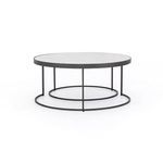 Complete nesting table set with small table centered inside larger table viewed from front