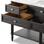 Close-up of two open drawers revealing oak interior with metal glides