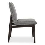 Side view of Charlie dining chair emphasizing the gentle pitch of padded backrest and cushioned seat