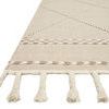 Close-up of Sawyer Sand Rug showing woven texture and thick fringed tassels at edge