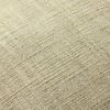 Close-up of heathered light green textured fabric with visible woven cotton fibers