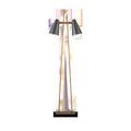 Duet Floor Lamp positioned in elegant room with green paneled wall and natural wood floor