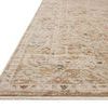 Close-up side view of rug edge showing thin fringe and low pile texture