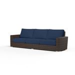 Montecito Sofa with three navy blue cushions, Cognac multi-colored resin wicker frame, outdoor style