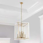 Lena chandelier installed in a dining room setting showcasing the clean, crisp lighting effect