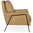 Side profile highlighting angular black metal frame and plush leather cushions with clean stitch detailing