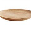 Round Mame dinner plate in natural wood with shallow, smooth curved edges and visible grain texture