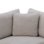 Close-up of three loose back cushions showing fabric texture and stitching details