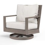 Alternate angle of Laguna Swivel Club Rocker showing seat cushions and round swivel base