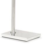 Close-up of the sturdy rectangular base with polished nickel finish supporting the floor lamp