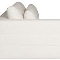 Side profile emphasizing clean-lined left arm and soft rounded sofa edges
