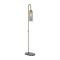 Lamp angled to show front and side with clear view of slender brass pole