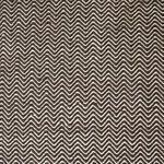 Detailed overhead close-up of Darla rug’s chevron pattern and textured PET yarn
