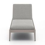 Outdoor chaise front view, backrest upright, showcasing textured gray fabric cushions