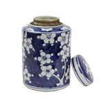 Mini tea jar with lid removed angled from slightly higher position showing interior and rim