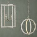Chandelier shown from the right side hanging next to a rectangular mother-of-pearl chandelier