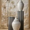 Kanti Accent Table in a room setting paired with large white ceramic jars and textured backdrop