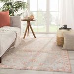 Fay Medallion rug in a bright living room with natural light, paired with light grey sofa and soft cushions