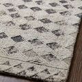 Detailed close angle of Yeshaia rug surface highlighting thick, raised weave and subtle color variations