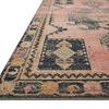 Low angle view highlighting the rug’s edge and texture with detailed floral and geometric border patterns