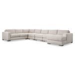 Front-facing slightly elevated view showcasing the sectional's length and consistent upholstery