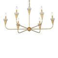 Gold chandelier with six arms shown from a slightly raised angle
