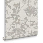 Rolled Esther Wallpaper showing the full pattern repeat with visible cotton texture on tonal Stone background