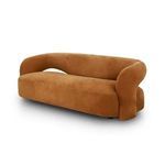 Alternate angled view focusing on sofa’s gently curved back and open cutout design
