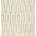 Hand-knotted beige and ivory rug with a geometric arrow pattern and fringed edges