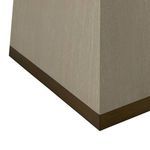 Close-up of angled tapered base with white-cerused texture and gold-toned banding detail
