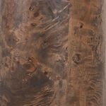 Close-up of rich burl wood grain texture on lamp base with natural knots and swirls