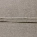 Close-up showing plush seat cushion with tailored flange along edge