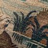 Close-up of intricate green texture and water feature from tapestry design with visible woven fabric detail