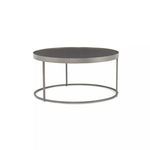 Single smaller round coffee table with black iron frame and dark gray metal top