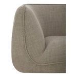 Close-up of soft taupe upholstery texture on curved armrest