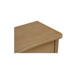 Close-up of the Clarence Nightstand top edge showing curved front detail and wood grain texture