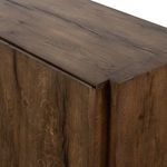 Tight close-up of oak wood grain on Perrin Sideboard door with visible natural cracks