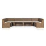Side corner view emphasizing the clean lines and uniform rattan weave on the frame