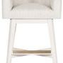 Front view with a wood tone footrest accent contrasting the white wood base