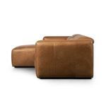 Side profile of Radley sectional highlighting smooth leather on chaise and sectional arm