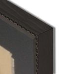 Close-up of the dark wooden frame corner showing carved detail and textured finish