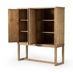 Tamara Cabinet with doors open revealing inner shelves and wood interior.