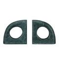 Two sculptures laid flat viewed from top showing the circular cutouts and dark green marble