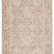 Full rug laid flat on white background showing overall color balance and aged mosaic design