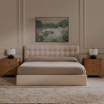 Saison framed painting hung above modern bedroom bed with beige bedding and wooden nightstands
