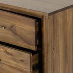View of dresser top corner edge showing chamfered detailing and wood joinery