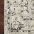 Corner close-up of Estelle Ivory Stone Rug highlighting subtle greys and beige tones in pattern