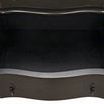 Close-up of open bottom drawer in Moira Night Stand displaying curved front and spacious interior