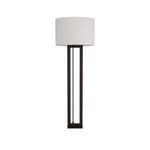 Side view of the bronze iron floor lamp showcasing the slim profile beneath the white drum shade